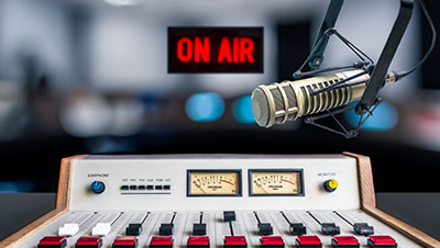 Radio imaging photo that shows equipment and says "On Air"